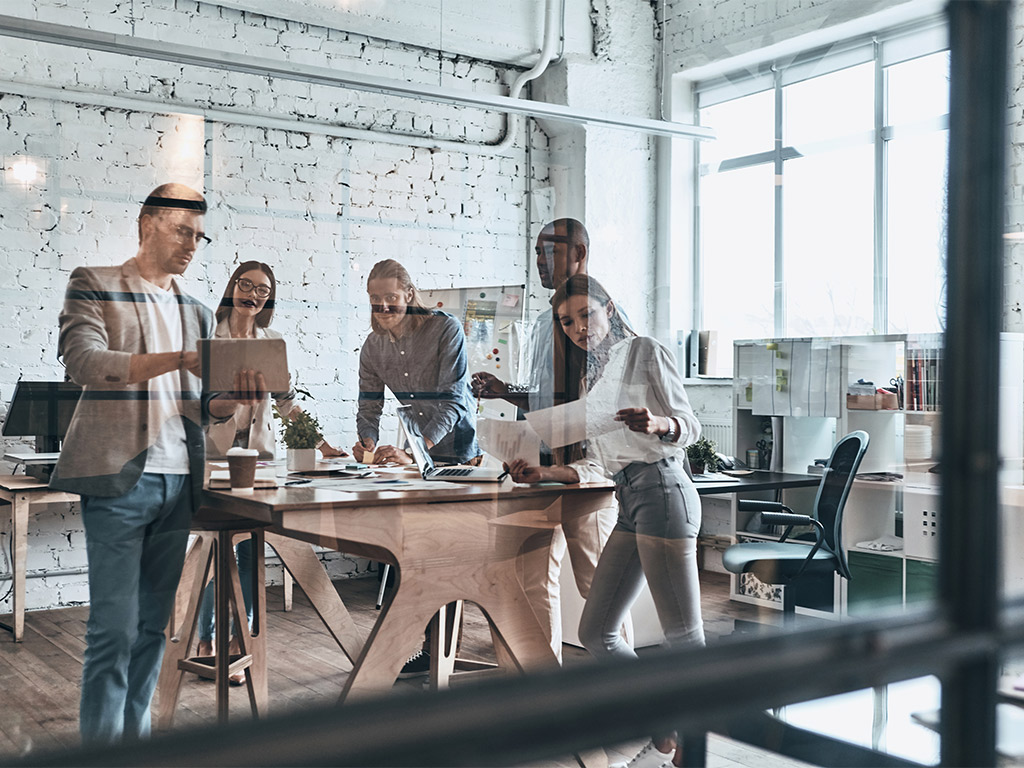 People collaborating in a modern workplace